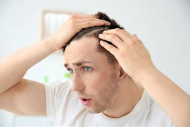 Is hair loss caused by hypothyroidism reversible?