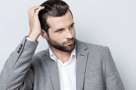 Does oily scalp cause hair loss?