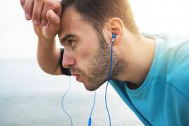 What causes excessive sweating of the head and face?